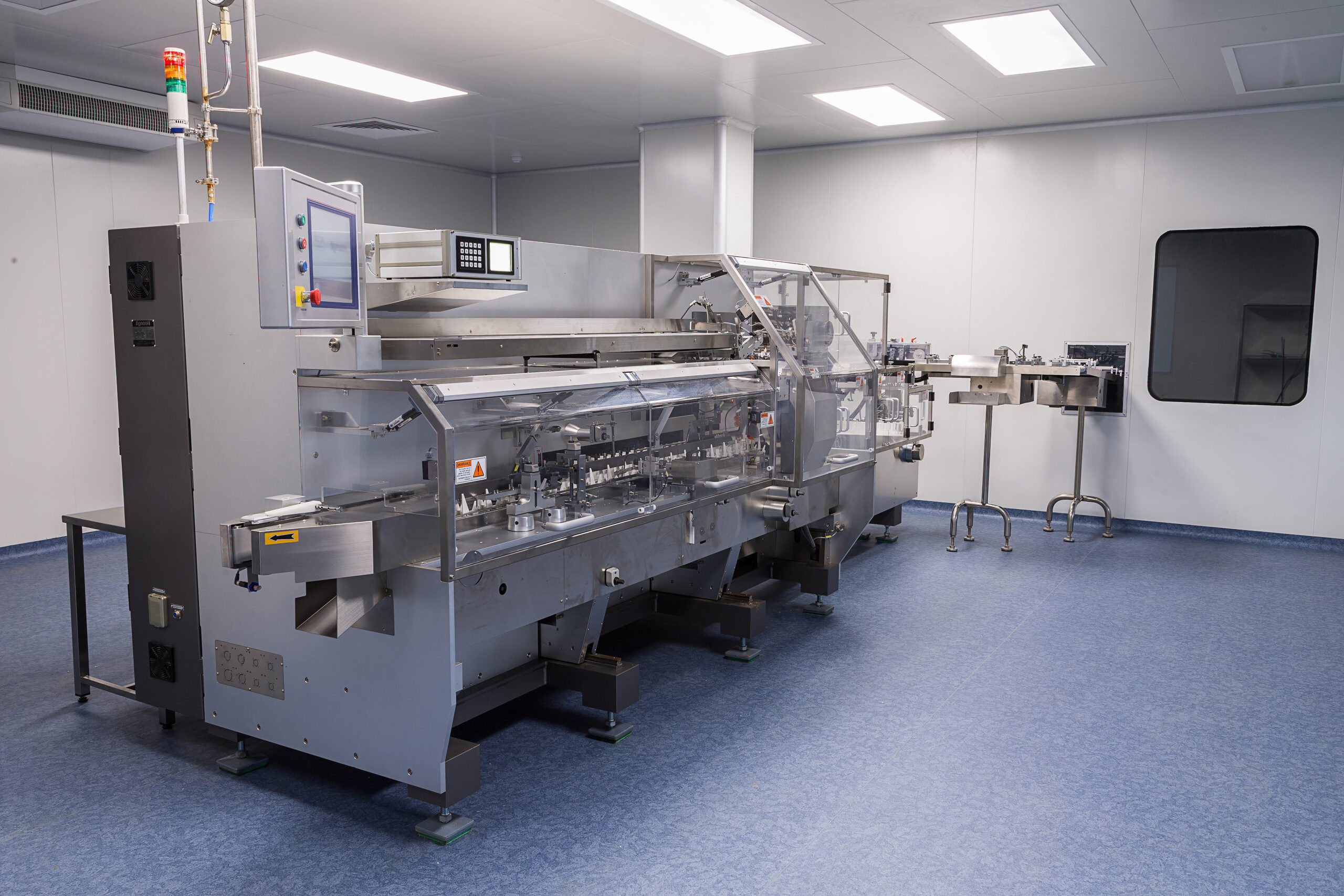 photos sterile production area with stainless steel machine for the production and sorting of pills and medicines